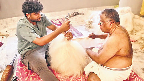 C Muraleedharan and nephew Akhilesh making the venchamaram for Paramekkavu devaswom’s kudamattam for Thrissur Pooram 
