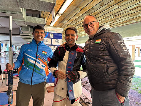 Chain Singh (C) with his coaches