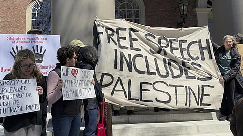 Students, faculty and members of the Harvard University community rally, Thursday, April 17, 2025, in Cambridge, Mass. 