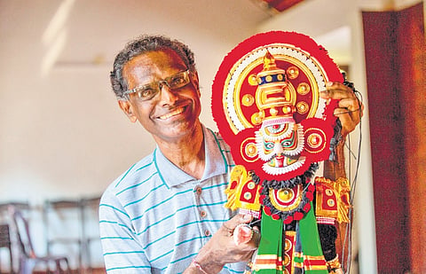 Ramesh K V with a yakshagana puppet