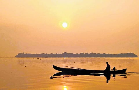 A morning view of Vembanad Lake and Pathiramanal Island 