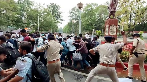 Police use lathi charge to disperse the Bihar Public Service Commission (BPSC) TRE 3.0 aspirants protesting outside the CM's residence demanding the release of the supplementary results of the exam, in Patna on Tuesday. 