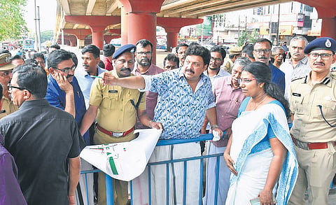 Transport Minister K B Ganesh Kumar discusses traffic modification plan with officials at Vyttila on Tuesday