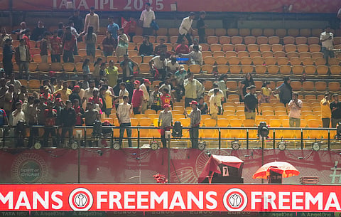 Fans being evacuated from the HPCA Stadium during the PBKS vs DC match on Thursday