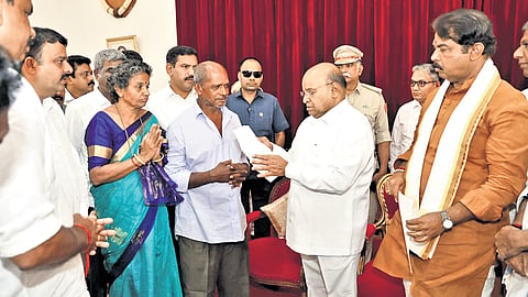 Parents of murdered VHP activist Suhas Shetty and BJP leaders led by state president BY Vijayendra and LoP R Ashoka meet Governor Thaawarchand Gehlot at Raj Bhavan in Bengaluru on Friday.