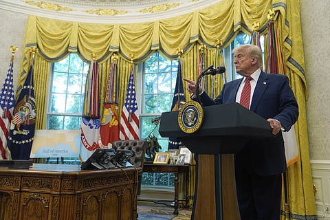 President Donald Trump speaks to reporters after David Perdue was sworn in as US ambassador to China during a ceremony in the Oval Office of the White House, Wednesday, May 7, 2025, in Washington.