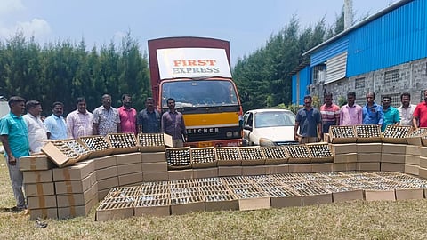 Police seized 10,032 counterfeit liquor bottles along with the lorry and an escorting car. 