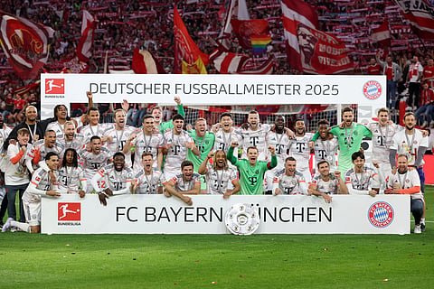 Bayern Munich with the Meisterschale trophy after winning the Bundesliga.