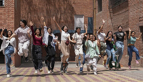 Class 12 students celebrate after CBSE declared the board exam results.