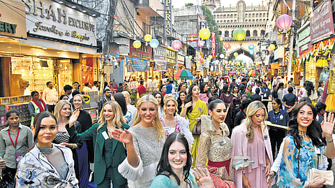 As part of a heritage walk, 109 contestants of the 72nd Miss World visit Charminar and Laad Bazaar on Tuesday. 