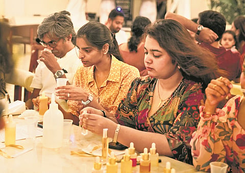 Participants crafting their own perfumes 