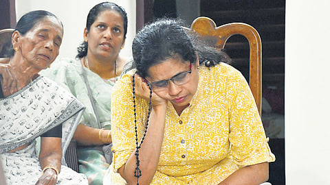 Rose Mary, mother of Ivin Jijo who died in the accident at Nedumbassery, sitting in sorrow at  their house in Thuravoor 