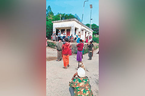 Officials interacting with the residents of Swamiyaralakudy tribal settlement in Munnar as part of preparation of the disaster management plan