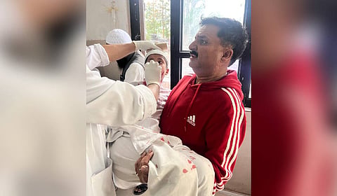 BJP leader and former J&K MLC Pradeep Sharma rescuing injured furing the cross-border shelling in J&K's Poonch district.
