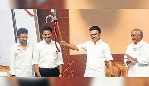 Minister Anbil Mahesh presenting an elephant goad to CM MK Stalin on Saturday. Deputy CM Udhayanidhi and Congress leader Digvijaya Singh look on 