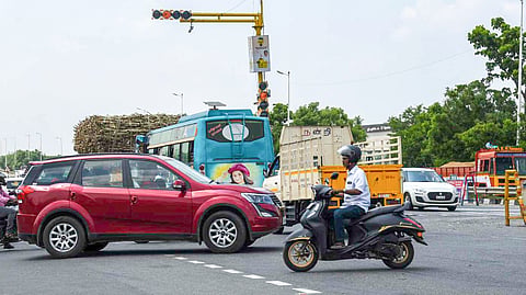  Vehicles passing after the red signal causing accident at Head post office signal in Tiruchy on Monday