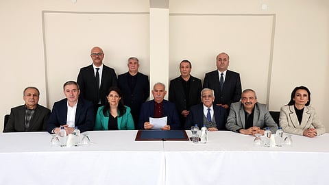 PKK founder Abdullah Öcalan, in the middle, reading the statement at Imrali prison island, Turkey, on February 27 (Photo | ANF News)