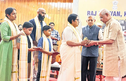 Governor Rajendra Arlekar felicitates Sheela Ramachandran, wife of Pahalgam martyr N Ramachandran, ahead of S Gurumurthy’s talk on ‘Operation Sindoor: Paradigm shift from candle light to BrahMos’ at Raj Bhavan in Thiruvananthapuram