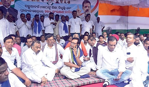 OPCC president Bhakta Charan Das and party leaders at the dharna site 