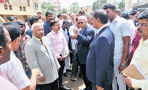 Lokayukta Justice BS Patil and Upa Lokayuktas justices KN Phaneendra and B Veerappa inspect flood-affected areas of the city on Thursday 