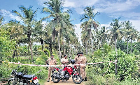 Coimbatore police inspecting the farmland owned by Yuthira Charitable Trust at S Nagoor near Naduppuni, where the body was allegedly buried, on Friday 