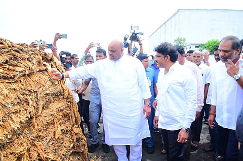 Ministers K Atchannaidu, G Ravi Kumar visited tobacco barns and interacted with farmers and tobacco buyers in Parchur in Bapatla district on Saturday. 