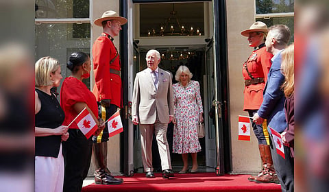 Britain's King Charles, centre left, and Queen Camilla leave after visiting the Canada House Trafalgar Square, in London, Tuesday, May 20, 2025 to mark 100 years since it opened in June 1925. 