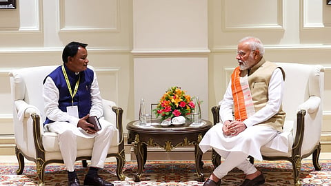 Chief Minister Mohan Charan Majhi  with PM Modi