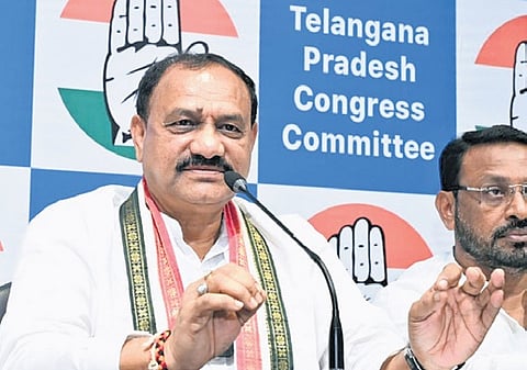 TPCC chief Mahesh Kumar Goud addresses the media at Gandhi Bhavan in Hyderabad on Friday