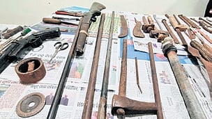 A double-barrel breech-loading pistol and a single-barrel muzzle-loading gun were among those seized from the accused. 