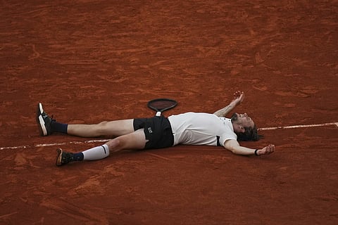 Kazakhstan's Alexander Bublik celebrates as he won the fourth round match of the French Tennis Open against Britain's Jack Draper at the Rolland-Garros stadium in Paris, Monday, June 2, 2025. 