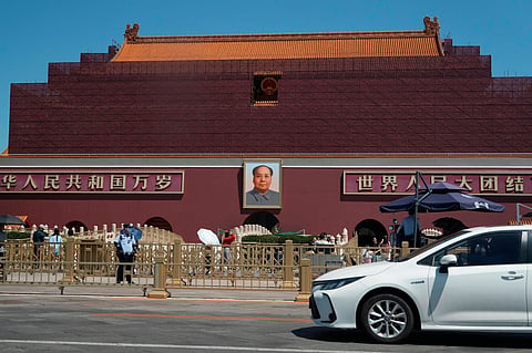 Security personnel stand on duty near the Tiananmen Gate which is under renovation on the anniversary of China's bloody 1989 crackdown on pro-democracy protests in Beijing.