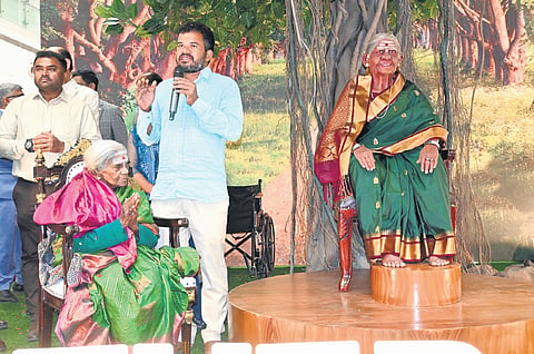Padma Bhushan environmentalist Saalumarada Thimmakka looks on, as her sculpture is unveiled at Orion Mall in Bengaluru on Thursday 