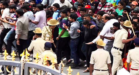 A large number of fans gathered outside the Chinnaswamy Stadium to participate in RCB's victory celebrations.