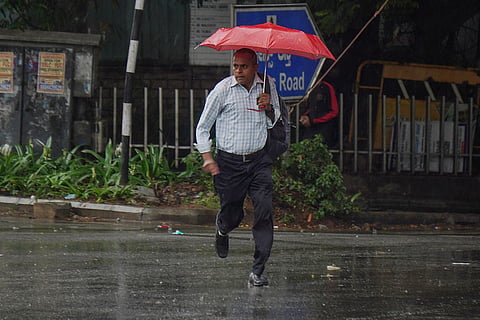 Bengaluru experienced sudden moderate rainfall during the evening hours.