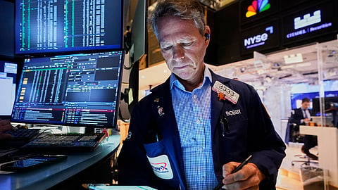 Trader Robert Charmak works on the floor of the New York Stock Exchange, Monday, June 9, 2025. 