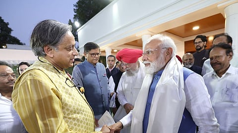 Prime Minister Narendra Modi with Congress MP Shashi Tharoor.