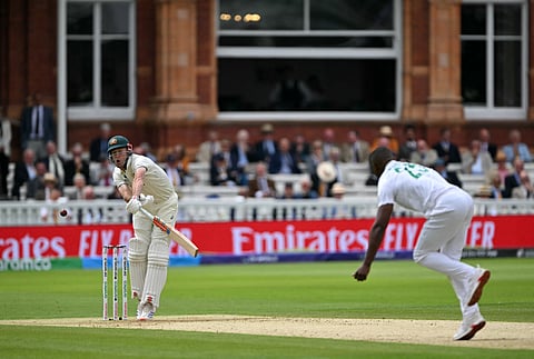 Australia's Beau Webster plays a shot of a ball from South Africa's Kagiso Rabada during day one of the ICC World Test Championship final match at Lord’s cricket ground, in London, on Wednesday