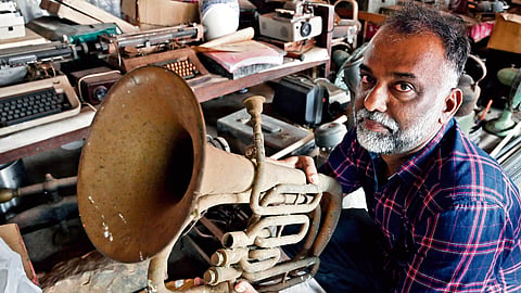 Abey with a trumpet he inherited from his grandfather’s collection