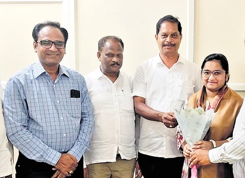 District Educational Officer (DEO) S Mondaiah felicitates Shubhashree in Karimnagar on Saturday. 