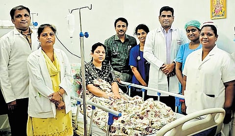 District Collector Pamela Satpathy with the team of doctors and nursing staff 
at the Karimnagar Government General Hospital after surgery.