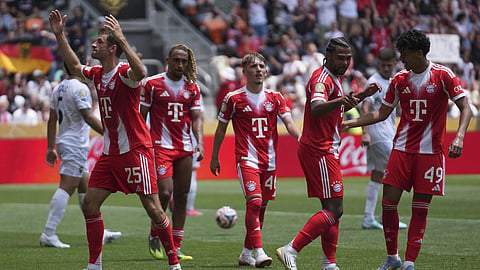 Bayern Munich’s Thomas Muller, left, celebrates after scoring his side’s tenth goal against Auckland City in Cincinnati. 