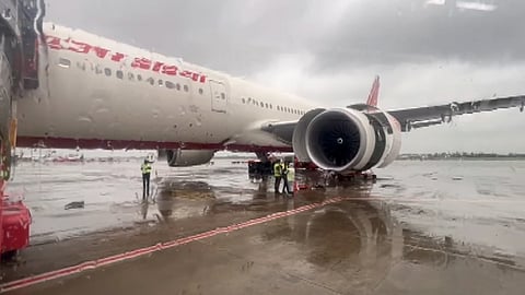 The Air India flight from San Francisco to Mumbai which suffered a technical snag in one of its engines due to which passengers had to be deplaned during a scheduled halt at the Kolkata airport, Tuesday, June 17, 2025. 