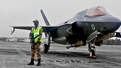 CISF personnel guarding the UK F-35 B stealth fighter, grounded at Thiruvananthapuram International Airport. 