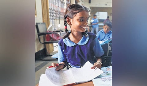 Students at a school for underprivileged kids run by an NGO at the Punjagutta Community Hall in Hyderabad. 
