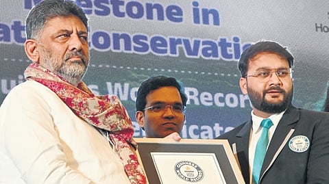 DCM DK Shivakumar receives the Guinness World Record certificate 
on Wednesday