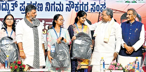 CM Siddaramaiah, DyCM DK Shivakumar and Energy Minister KJ George at the inauguration of the diamond jubilee celebrations of the Karnataka Electricity Transmission Corporation Employees’ Association in Bengaluru on Wednesday