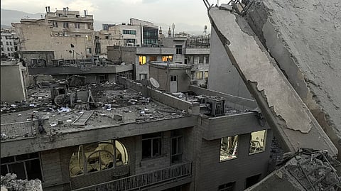 Debris and rubble are pictured at the scene of a building that was hit by an Israeli strike in Tehran