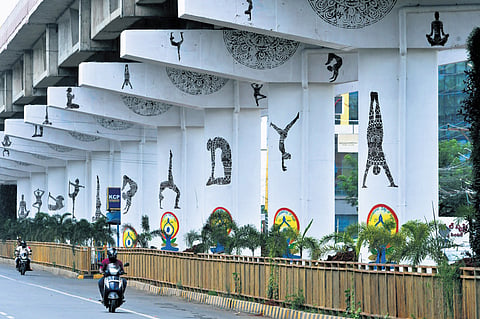 Yoga Asanas were painted on the columns of the flyover near Nirmala Convent in Vijayawada 