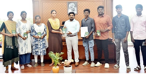 A few of the students who cleared the national-level entrance exams pose with the District Collector